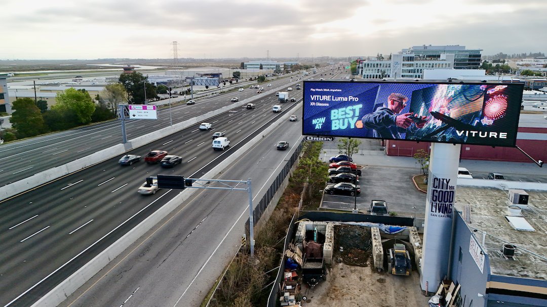 VITURE × Cyberpunk 2077 billboard beside a Bay Area freeway